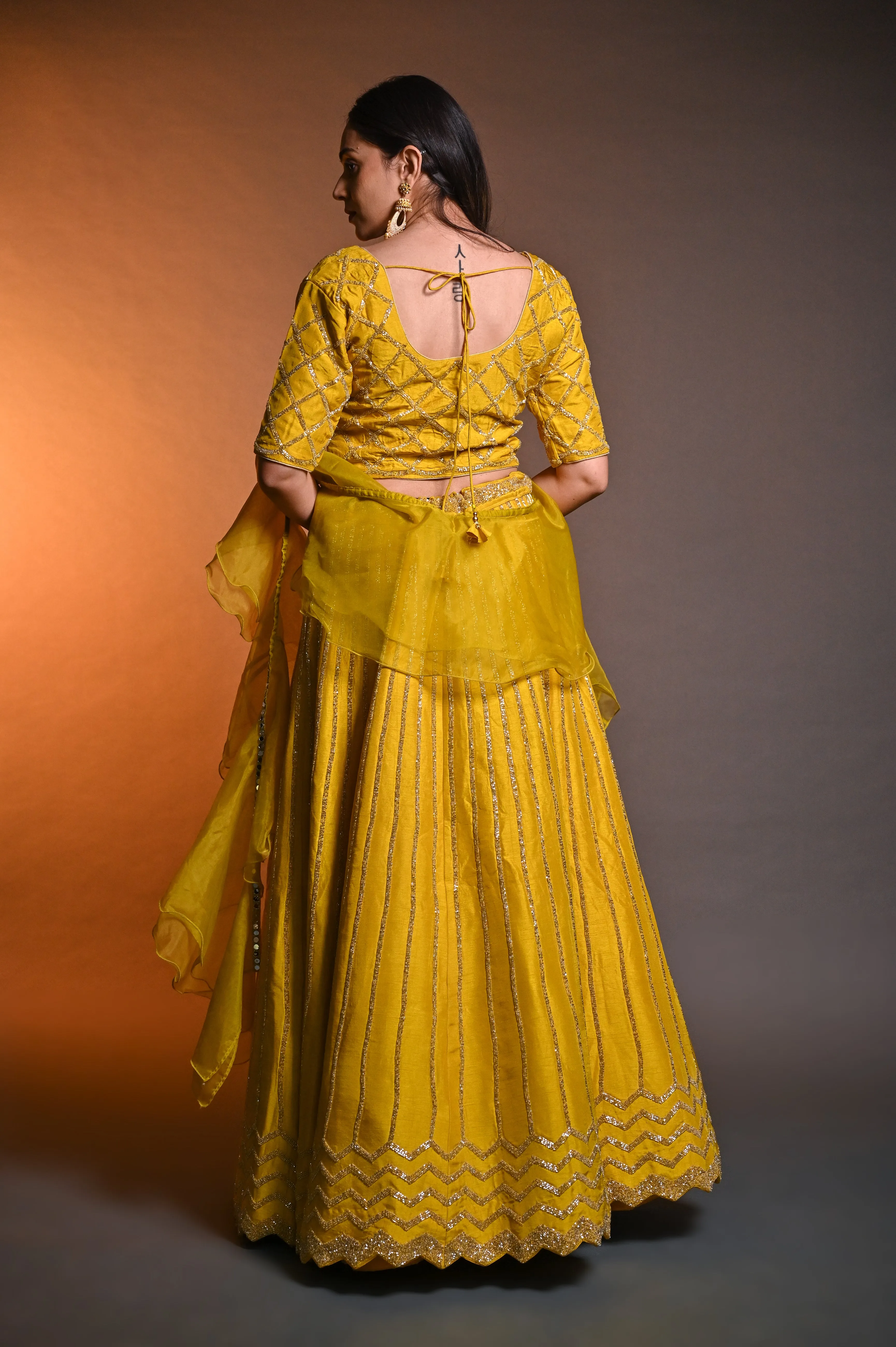 Mustard Raw Silk Cutdana Lehenga Choli with Kasab Ari Work